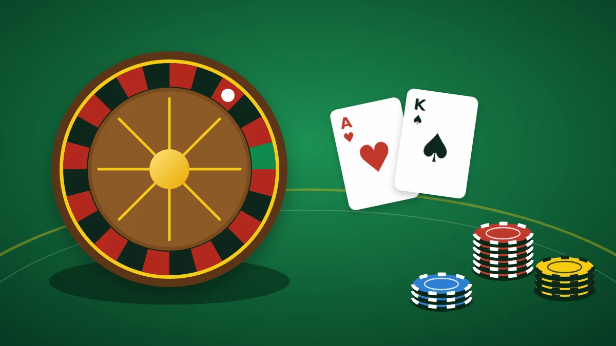 Roulette wheel on green felt with playing cards and casino chips